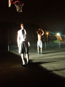 Late summer nights in Nova Scotia. Lindell and big brother Rodell getting shots up at 2AM 