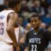 Dec 12, 2014; Minneapolis, MN, USA; Minnesota Timberwolves guard Andrew Wiggins (22) looks at Oklahoma City Thunder forward Kevin Durant (35) during the third quarter at Target Center. The Thunder defeated the Timberwolves 111-92. Mandatory Credit: Brace Hemmelgarn-USA TODAY Sports